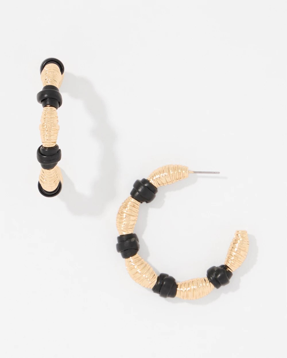 WHBM_ER20Gld20Sculpt20Knot20Hoop_570409893_TAN000932_TT_MAIN.jpeg