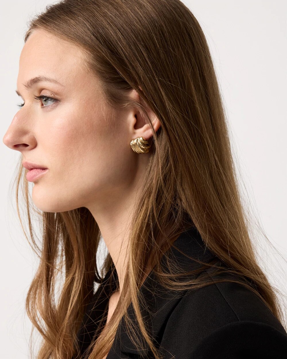 WHBM_ER20Gld20Sculpt20Knot20Stud_570409890_TAN000932_OF_MAIN-1.jpeg