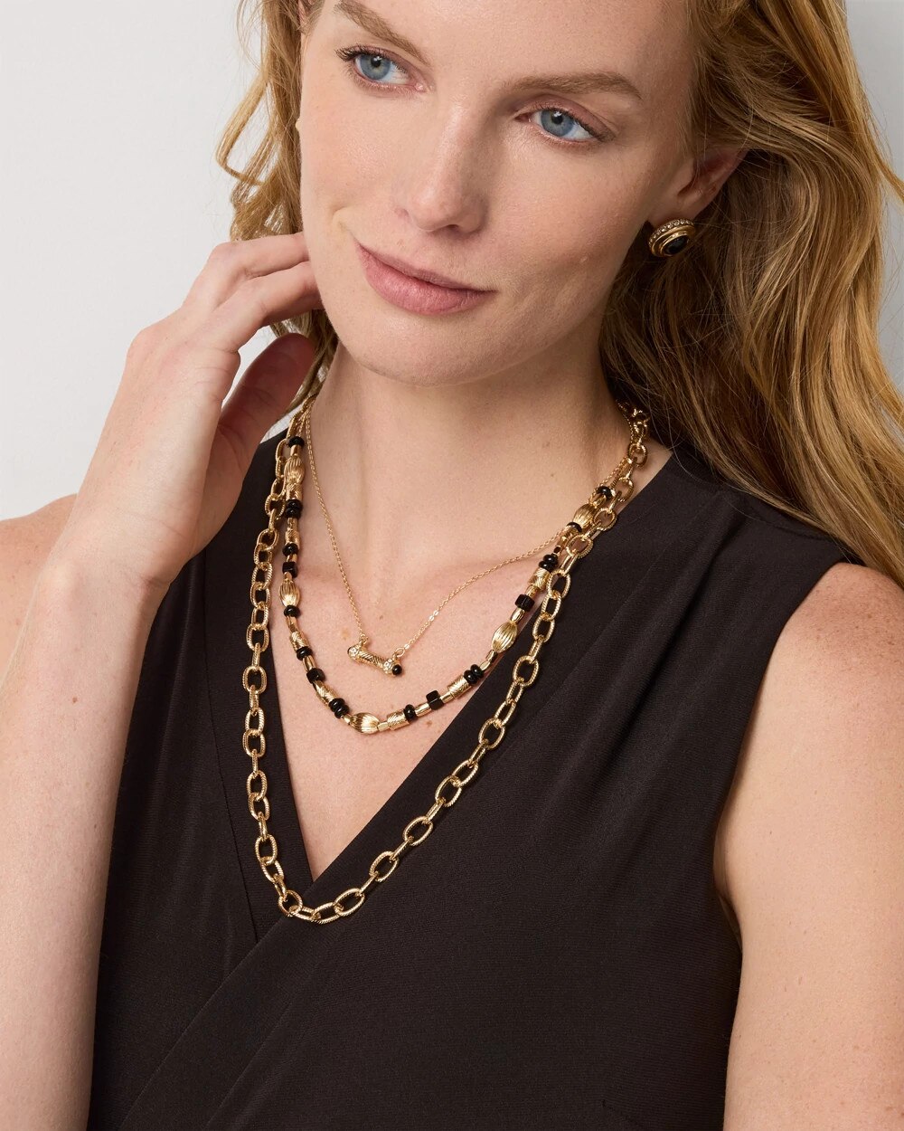 WHBM_NK20Gld20Convt20Black20Cab20MR_570414216_BLK001101_OF_MAIN-1.jpeg