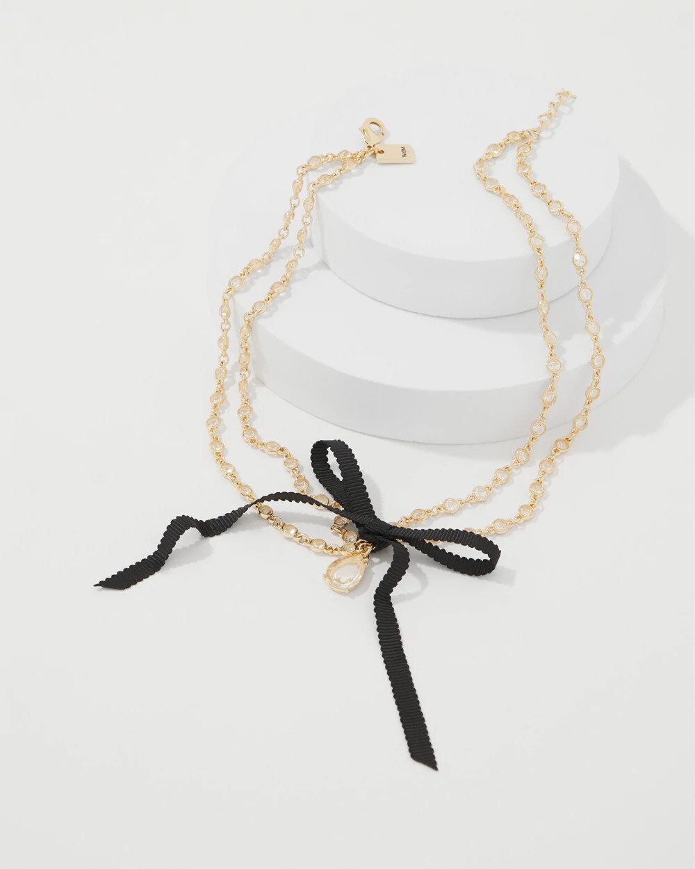 WHBM_NK20MS20Crystal20with20Bow_570407780_TAN000932_TT_ALT201.jpeg