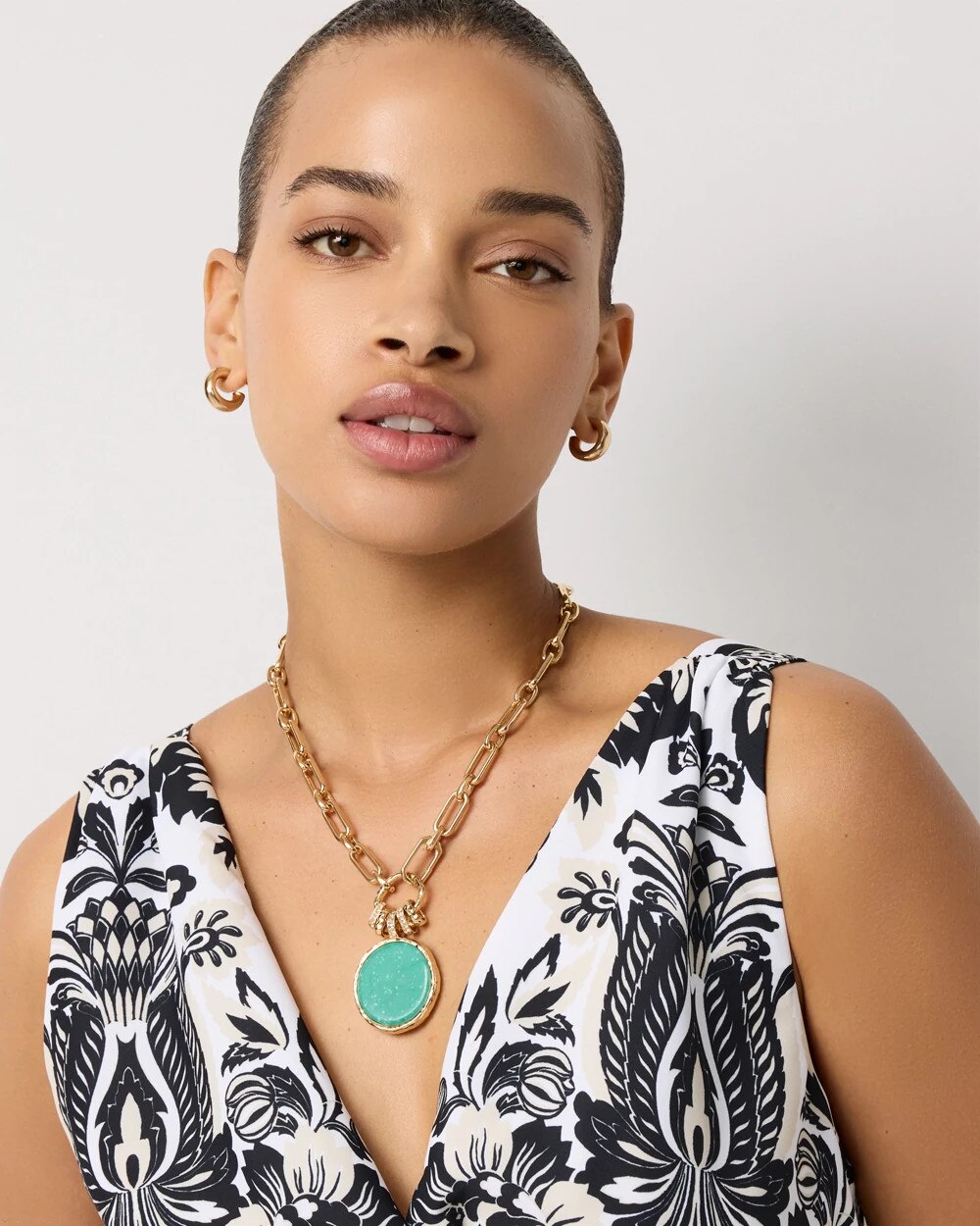 WHBM_NK20Turquoise20Coin20Pendant_570414204_BLU003603_OF_MAIN-1.jpeg
