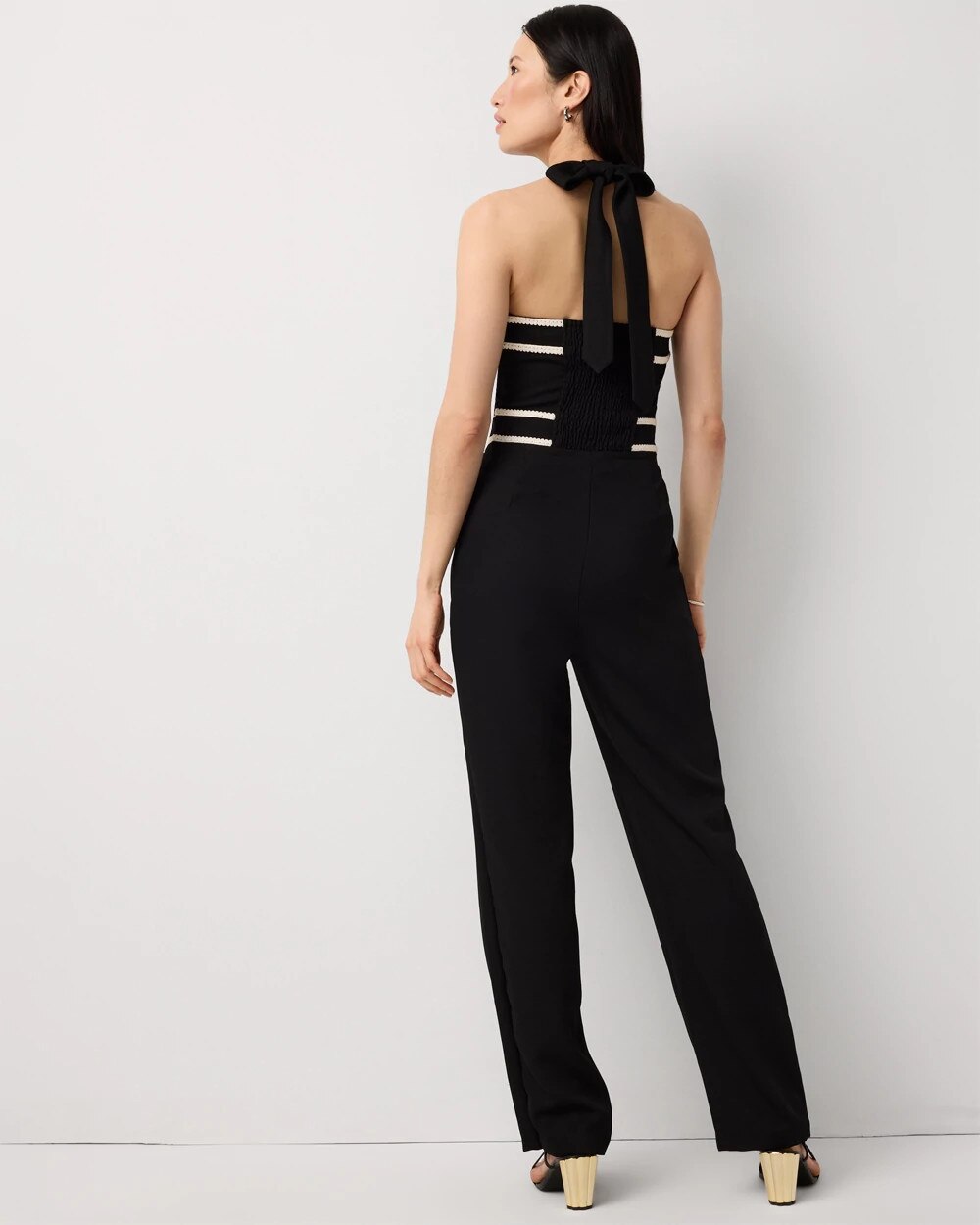 WHBM_SL20Halter20Emb20Jumpsuit_570406560_BLK007415_OF_ALT203.jpeg