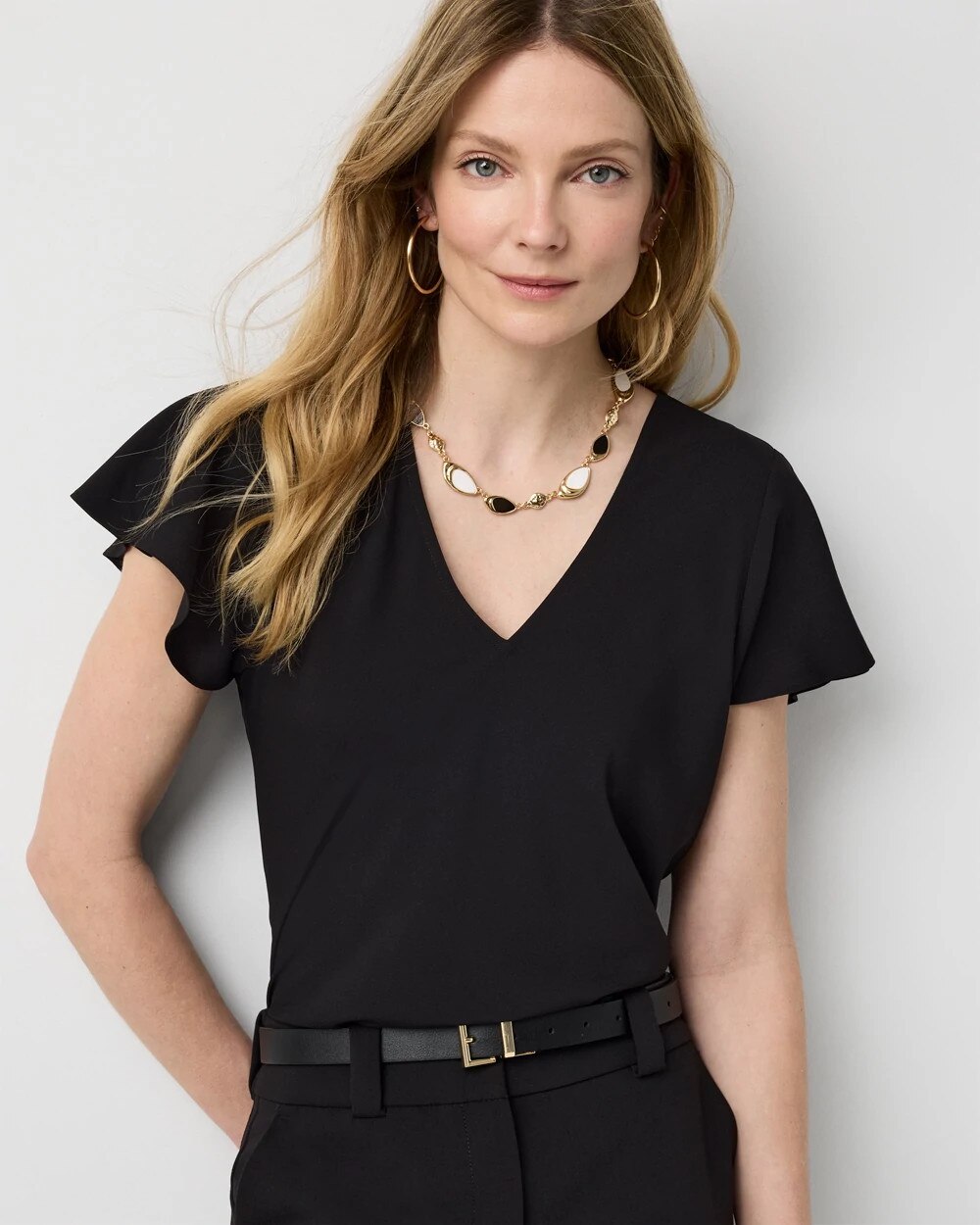 WHBM_SS20Flutter20Crepe20Blouse_570411153_BLK000001_OF_MAIN-1.jpeg