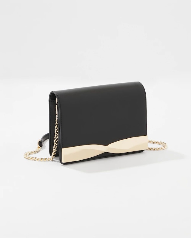 WHBM_Twisted_20Hardware_20Clutch_570393610_BLK000001_TT_MAIN.jpeg